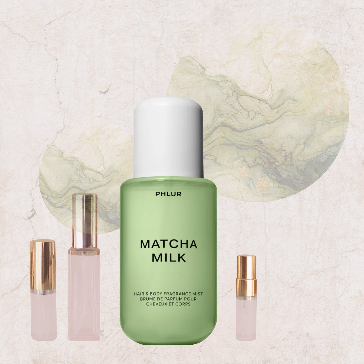 Phlur Matcha Milk hair and body fragrance mist with sample bottles in soft pastel background.